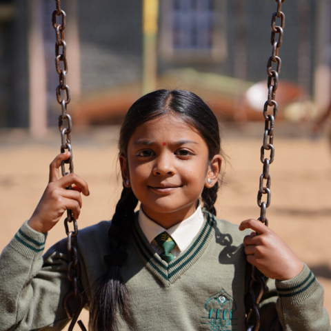 Girl in swing - Top primary School in ooty