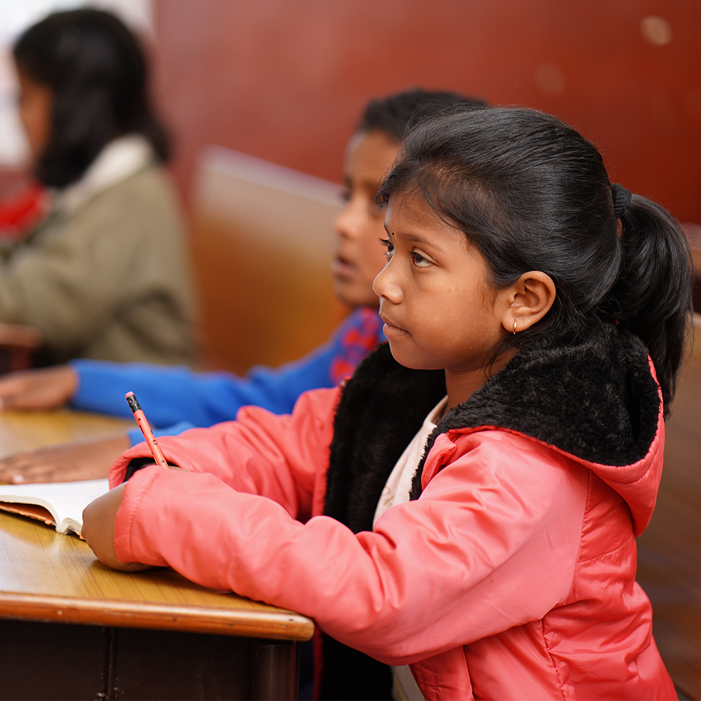 Girl attending classes - top kindergarten school in ooty