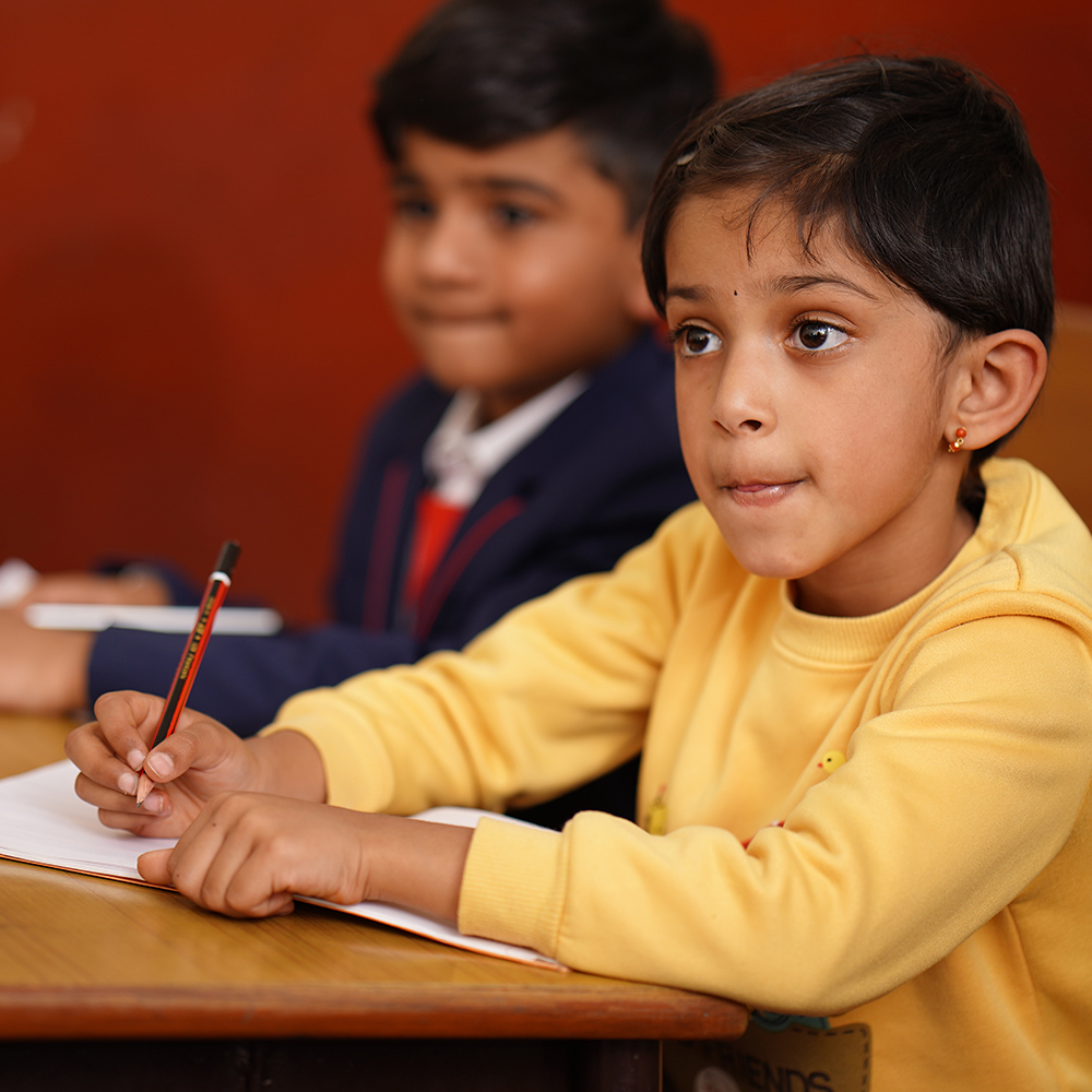 Student writing - best primary school in ooty